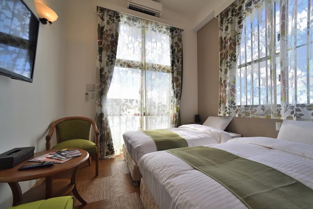 Cosmos Omoromachi Station Aparthotel Naha Bagian luar foto